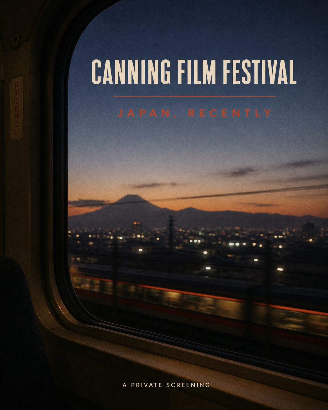 Canning Film Festival poster showing Mount Fuji through a train window at dusk